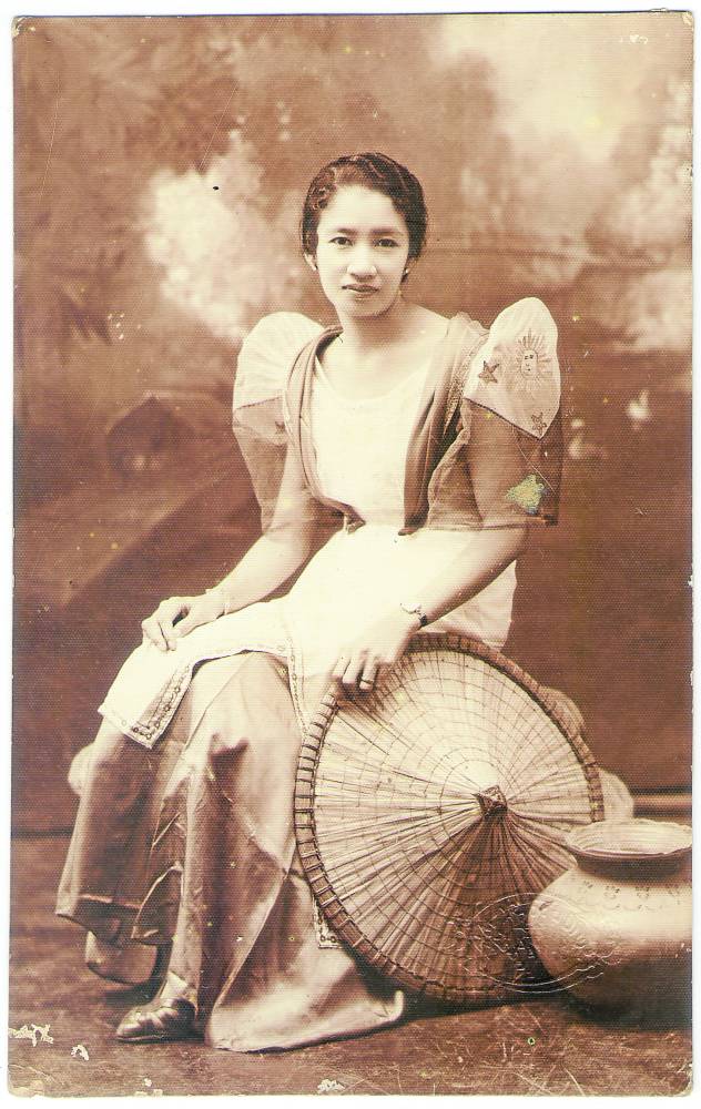 Balintawak with an image of the Philippine flag on the butterfly sleeves —FROM THE Collection of Gino Gonzales