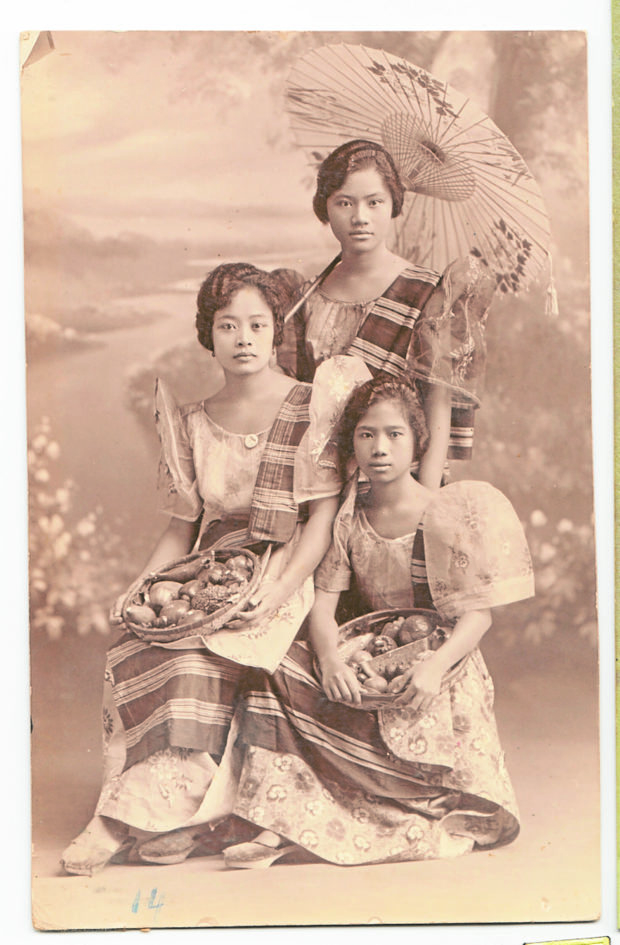 Hand-tinted postcards of 1930s Balintawak from the album of Josefina T. Gonzales, a second-generation designer from the house of R.T. Paras. They show the various components of the ensemble and how they can be worn.