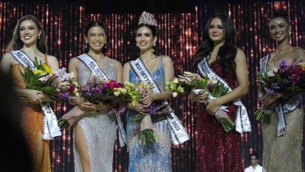 Miss Universe Philippines Celeste Cortesi (center) with her fellow queens (from left) Annabelle McDonnell, Michelle Dee, Pauline Amleinckx, and Katrina Llegado/ARMIN P. ADINA