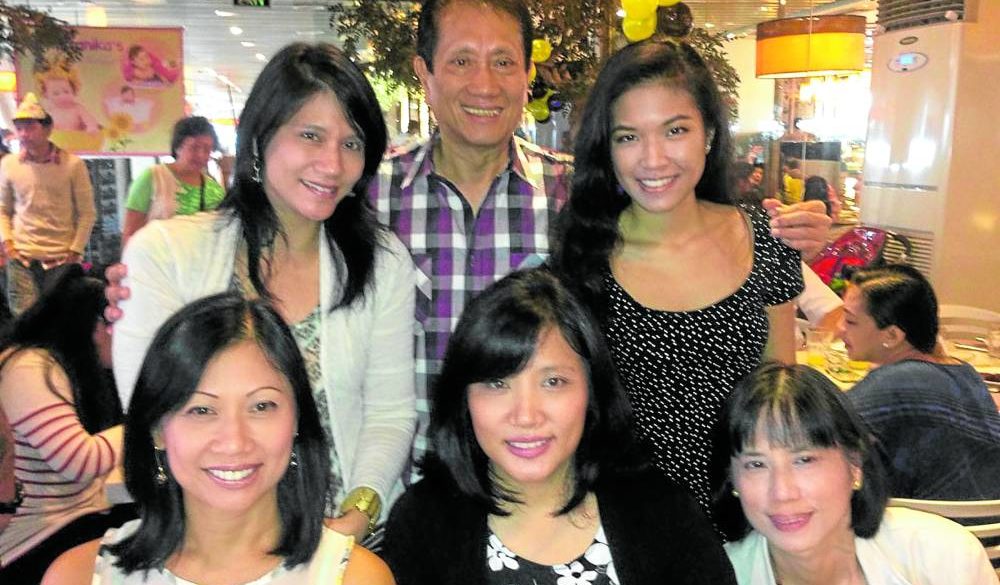 The author in a rare reunion with all his five daughters before the pandemic: (seated) Maysie Houlihan, Minnie Carlos, Minu Yuzon; (standing) Celine Perpiñan, the author and Bianca Henares