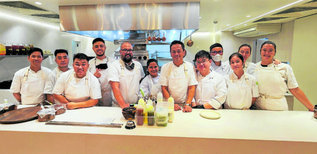Chef Sau del Rosario (seventh from left), chef Bong Sagmit (fifth from left) and the Sawsaw team