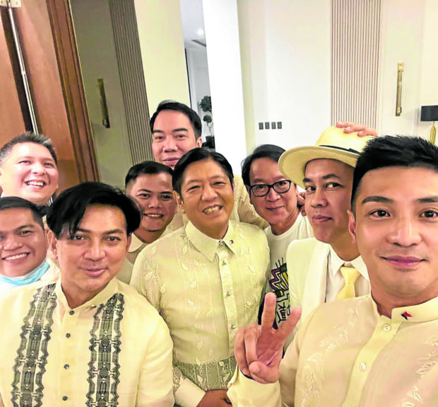 The President (center) in his evening barong by Pepito Albert, with stylist Michael Salientes, makeup artist Patrick Rosas, fashion designers Jojie Lloren and Lesley Mobo, and other supporters