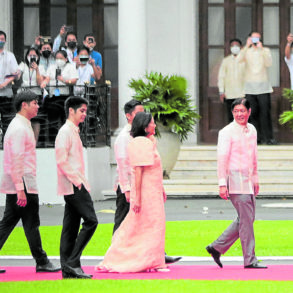 President Ferdinand Marcos Jr., in Pepito Albert, leads his wife and sons into Malacañang after Thursday’s inauguration