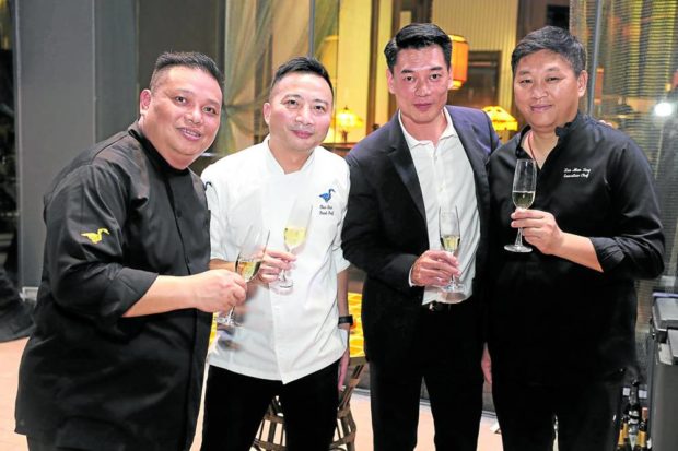 Chef Tam, chef Chin Chin, Mott 32 cofounder Xuan Mu, executive chef Lee Man Sing