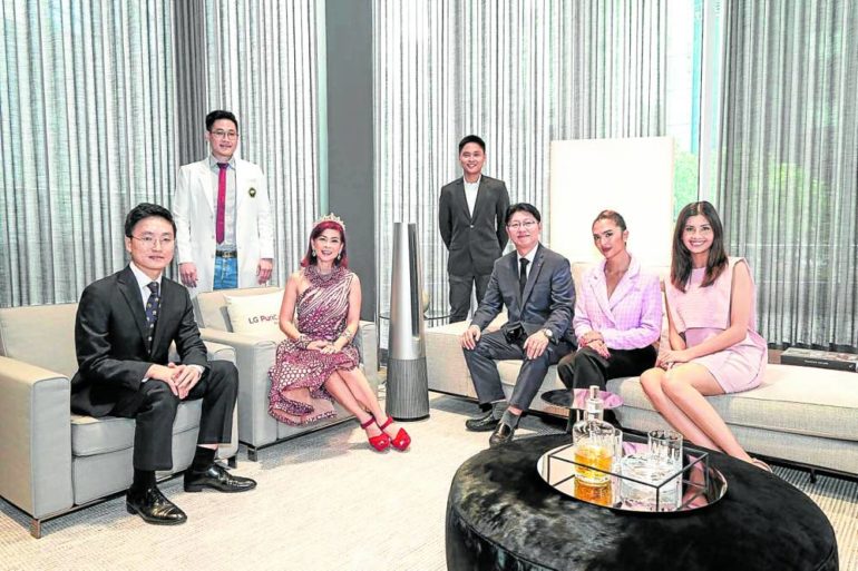 LG Air Solutions product director Changsoo Jang, Sea Princess, LG Philippines managing director Sungjae Kim, Sofia Andres, Shamcey Supsup; standing: Dr. Jansen Calalan, AeroTower product manager Jave Enriquez