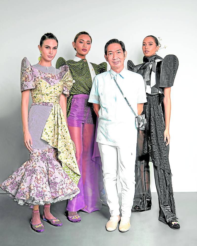 Joey Samson with models wearing his versions of the 'balintawak'.