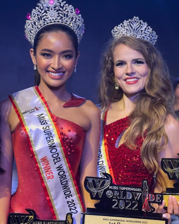 Alexandra Mae Rosales of the Philippines (left) beams after her coronation as Miss Supermodel Worldwide beside first runner-up Kaylee Roxanne Porteges Zwart from the Netherlands./MISS SUPERMODEL WORLDWIDE FACEBOOK PHOTO