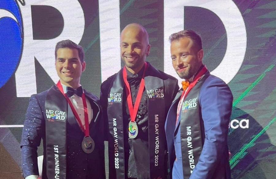 Newly-proclaimed Mister Gay World Jose Lopez from Puerto Rico (center) poses with (from left) first runner-up Tony Ardolino from the United States and second runner-up Max Appenroth from Germany./MISTER GAY WORLD FACEBOOK PHOTO