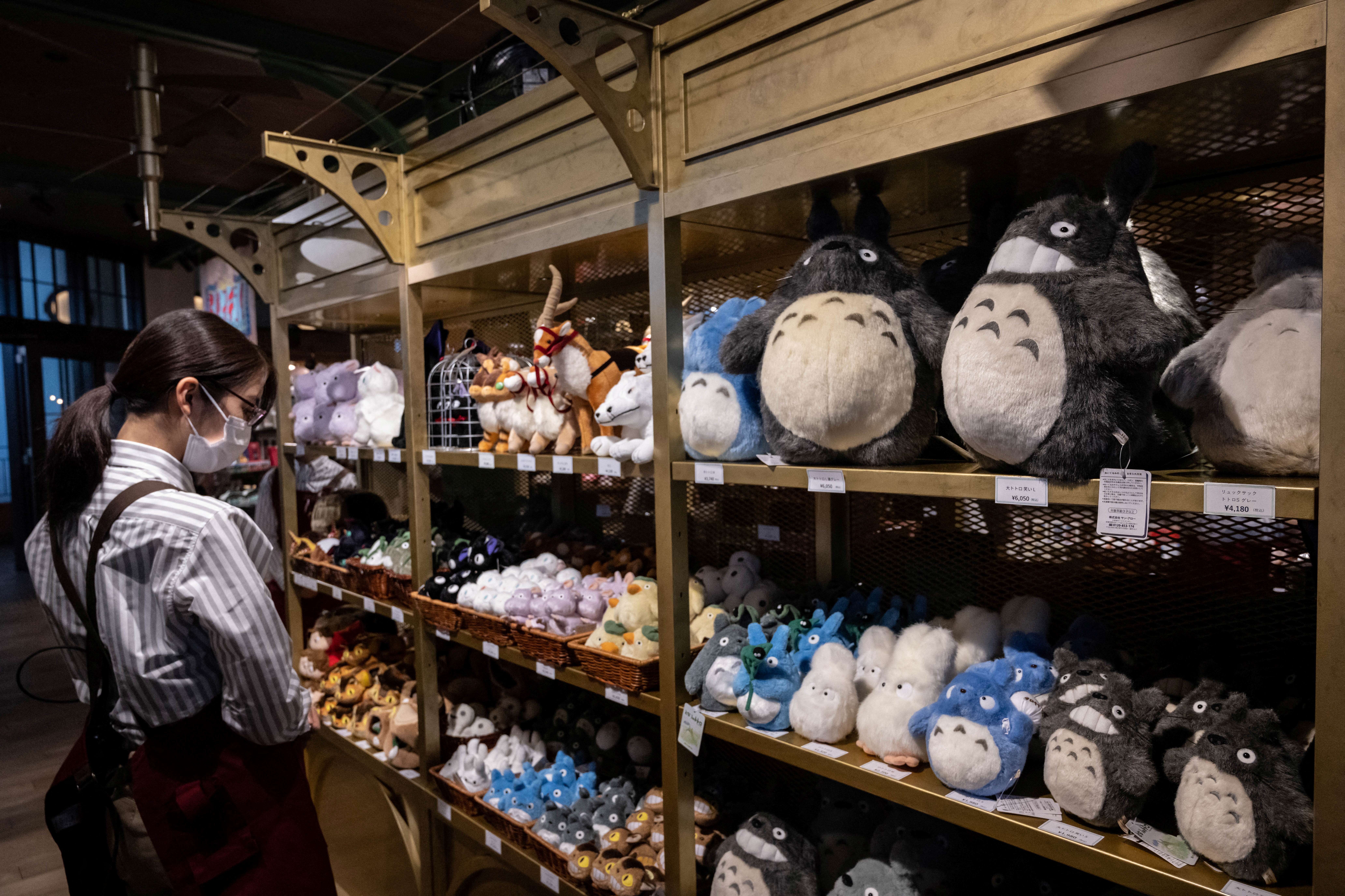 Whimsical exhibits welcomed visitors to Japan's new Ghibli theme park as three of its five sections opened