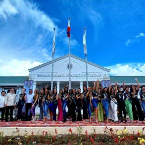 Miss Earth candidates take a photo with local officials in front of Ligao City Hall before the preliminary competition scheduled on Monday (Nov. 21) evening.