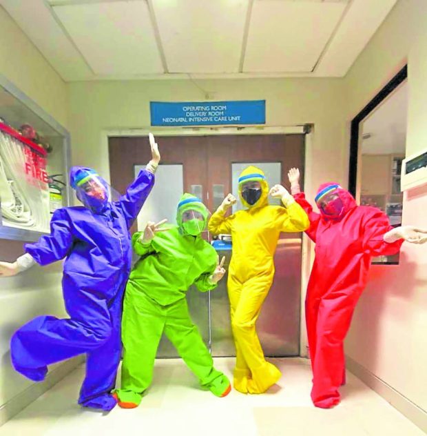 Nurses and other health workers at The Medical City Iloilo wearing colorful hazmat suits in the midst of lockdowns in April 2020. —Photo courtesy of Adrian Pe 