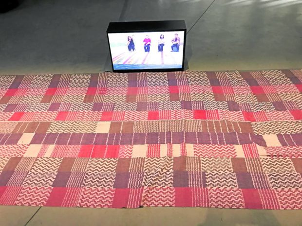 Tan calls this a “reiteration of Metro Manila” as the video depicts performers following the patterns of the woven Metro Manila-Ifugao textile .