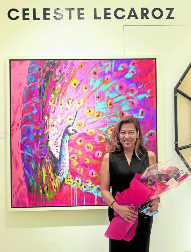 Celeste Lecaroz with her work inspired by the myth 
of hundred-eyed Argus, 
which is a commentary 
of the use of social media. 