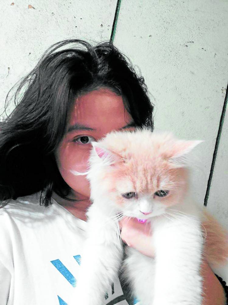 Beatrix Calimag and her cat Chinee