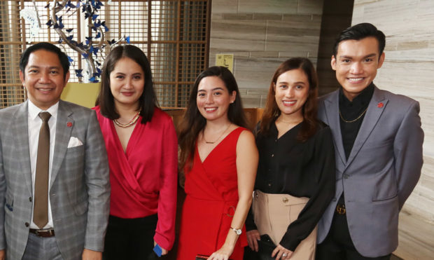Gerald Magtoto, Director for Lifestyle Marketing; Kat Dalusong; Aina Elinon, Public Relations Officer; Joy Andrade, Assistant Director for Public Relations; and Filbert Norman Maling, Assistant Manager for Brand & Advertising of Newport World Resorts.