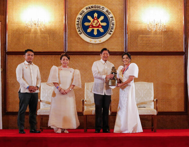 President Ferdinand R. Marcos, Jr. confers the Dangal ng Bayan Award to Adeline P. Baarde