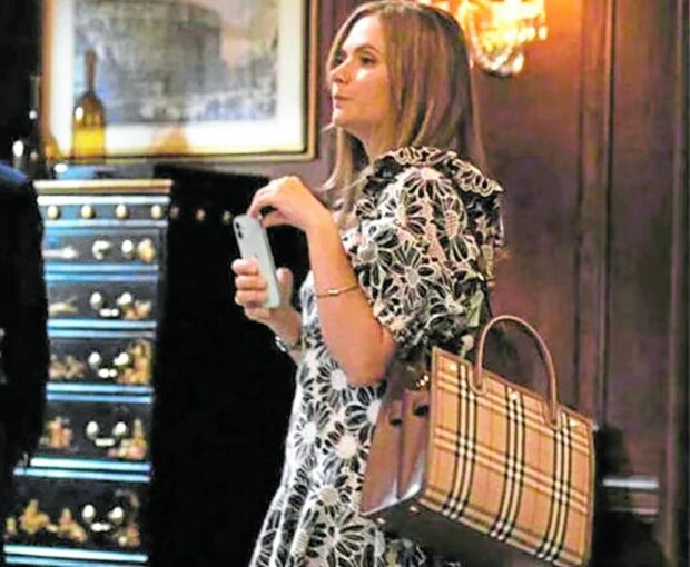 The character Bridget on “Succession” with her ludicrously capacious Burberry bag