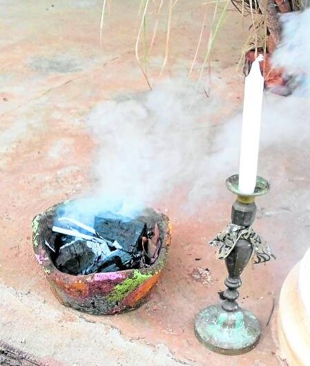 Ritual smoke from collected materials, mixed with burning candles, can create amulets (“anting-anting”).  