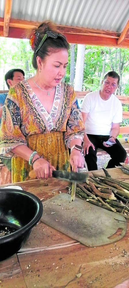 Maria Mayor Roselyn Asok shows dexterity in chopping the collected materials to be processed into medicine to cure various illnesses and, depending on the ingredients, produce love potions and amulets.