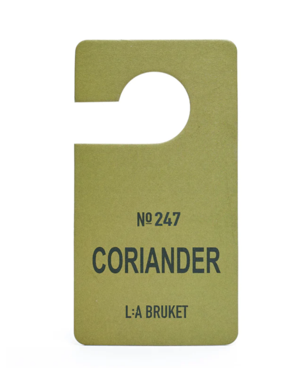 L: A Bruket Fragrance Tag in Coriander