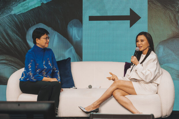 Dr. Rosario Blas seated in the panel discussion with Dr. Vicki Belo