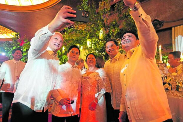 Guests take a selfie with Rep. Sandro Marcos, the first lady and House Speaker Martin Romualdez