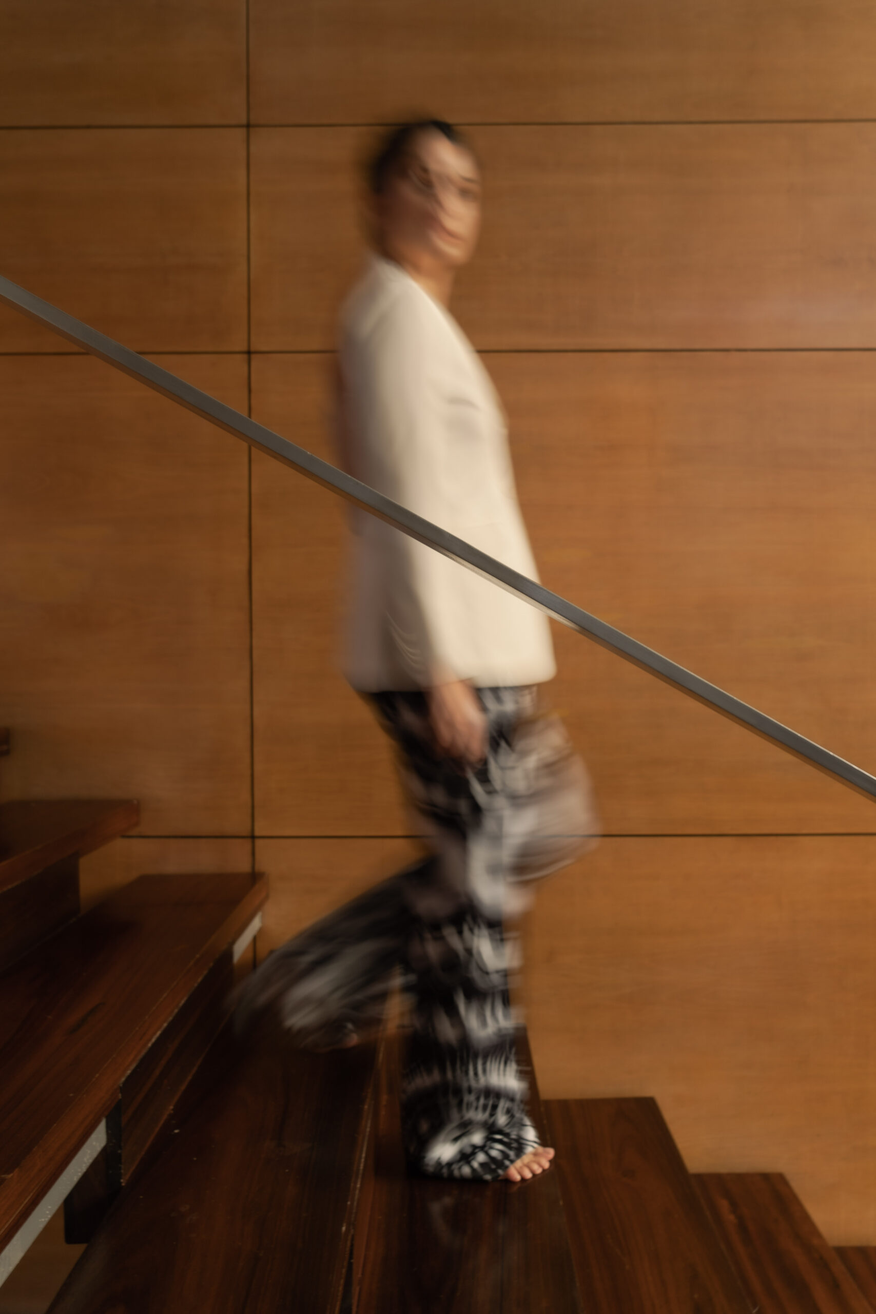 photo of girl going down the stairs with blurred face