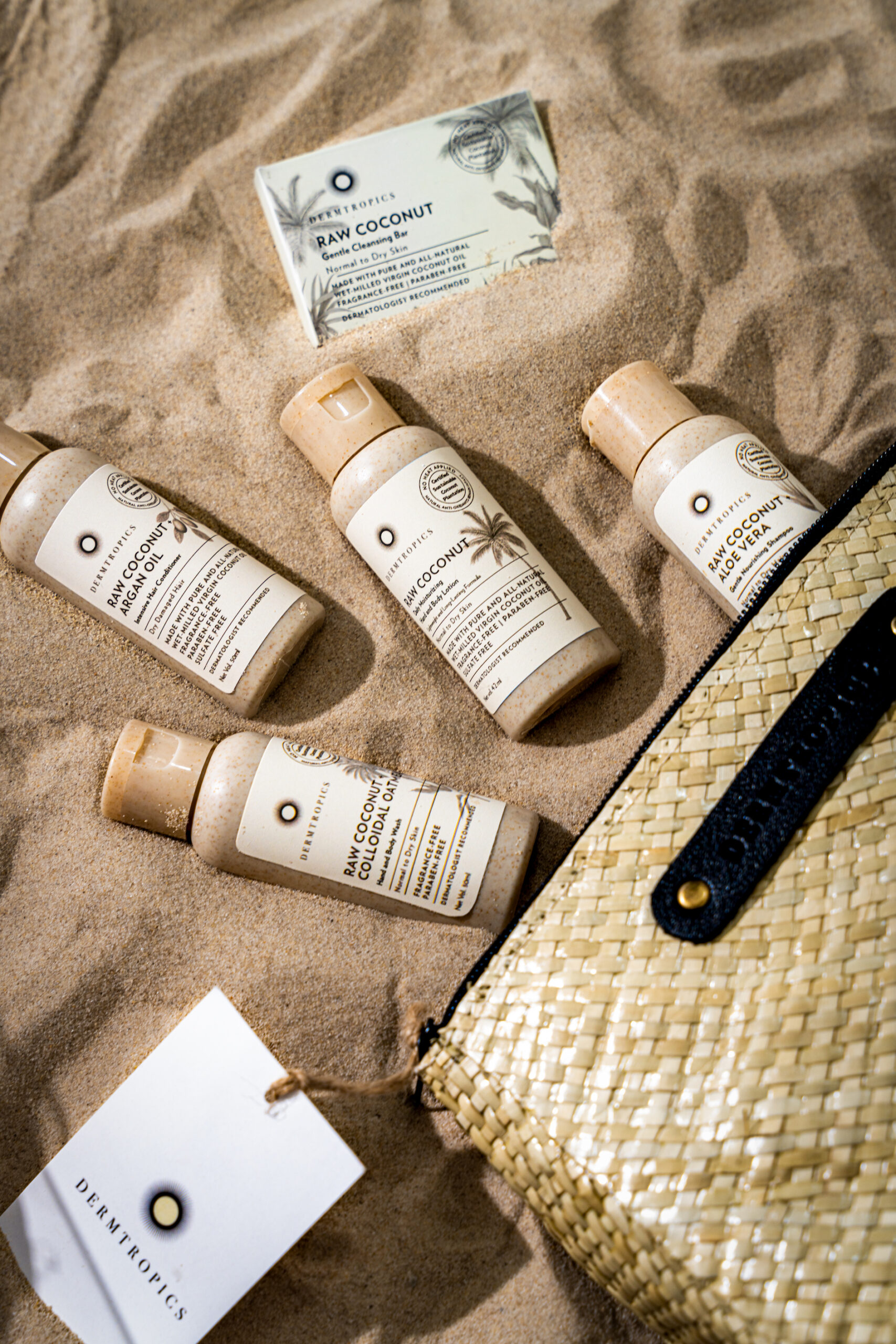 skincare products on sand