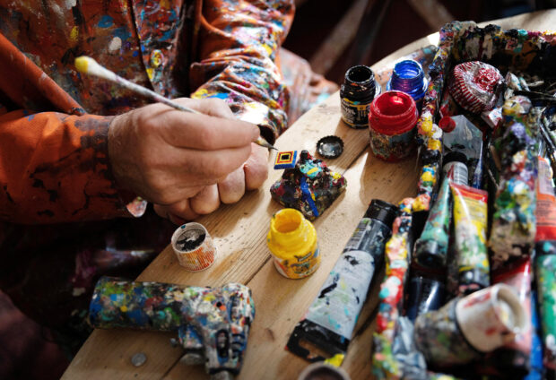 Chewing gum artist paints 'hidden world beneath their feet', in London