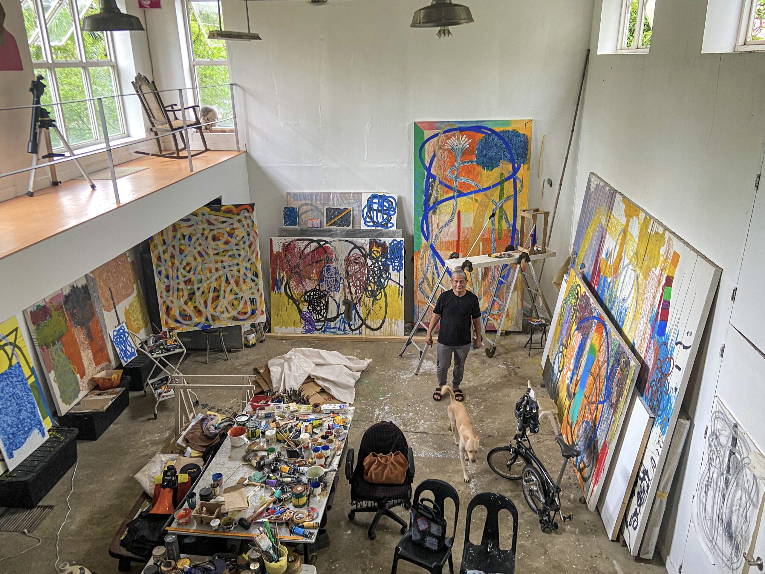 man in a colorful studio