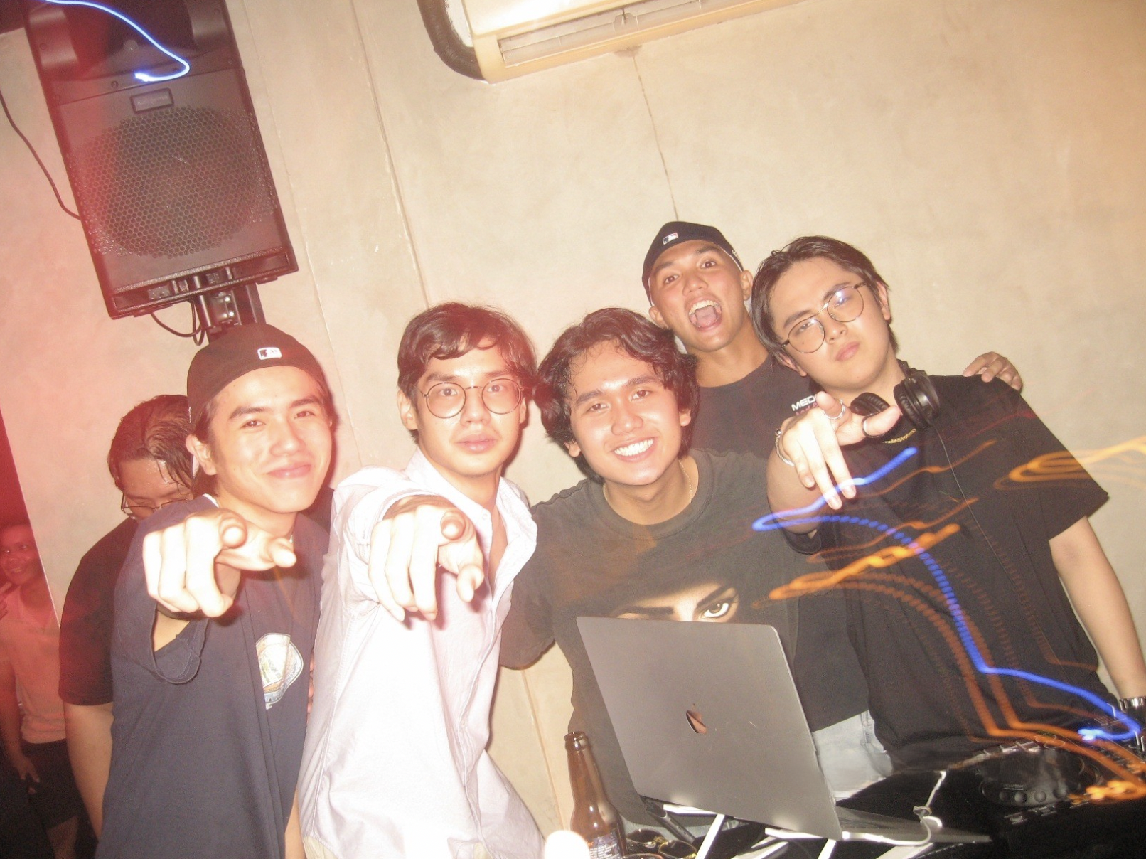 Lan Kwai Speakeasy’s Managing Partners, Emerson Ong, Luca Liza, Reiner Mendoza, and Kean Nerecina, together with their close friend Alfonso Abrogar by the DJ booth
