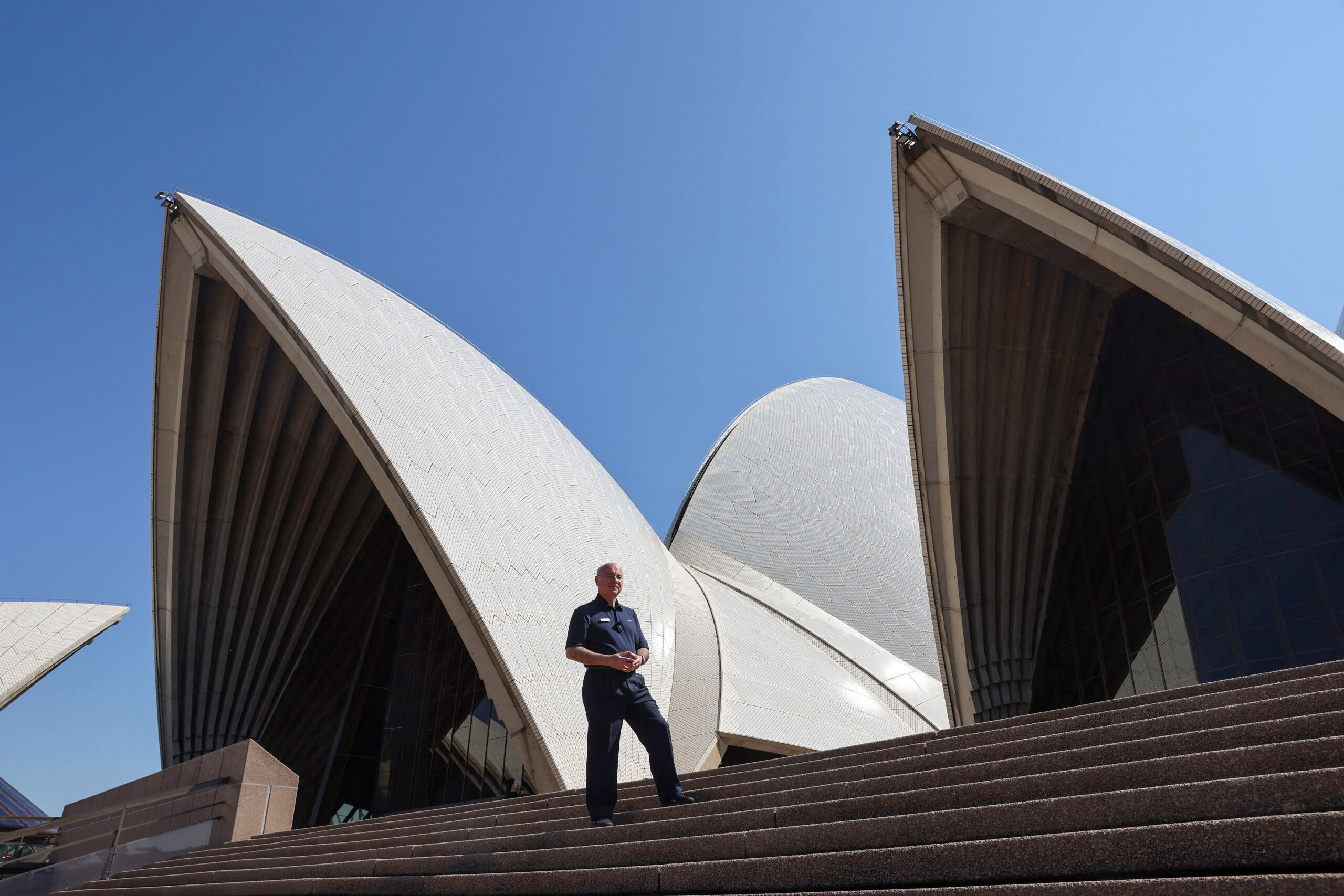 FILE PHOTO: Former architect Peter Sekules poses at the Sydney Opera House