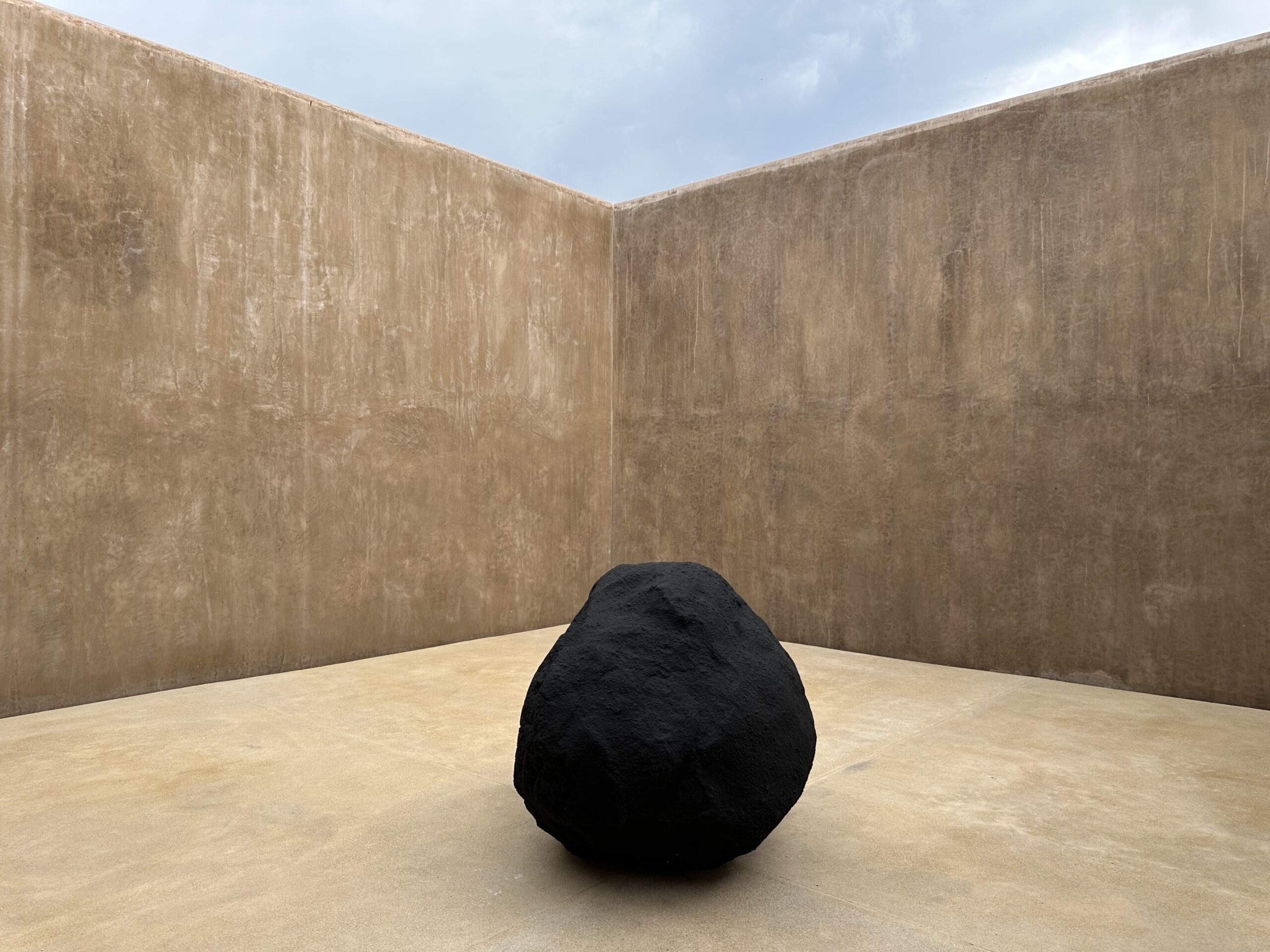 Deductive Object—Bottari, 2023 | rock, matte black water-based paint, 117 x 128 x 176