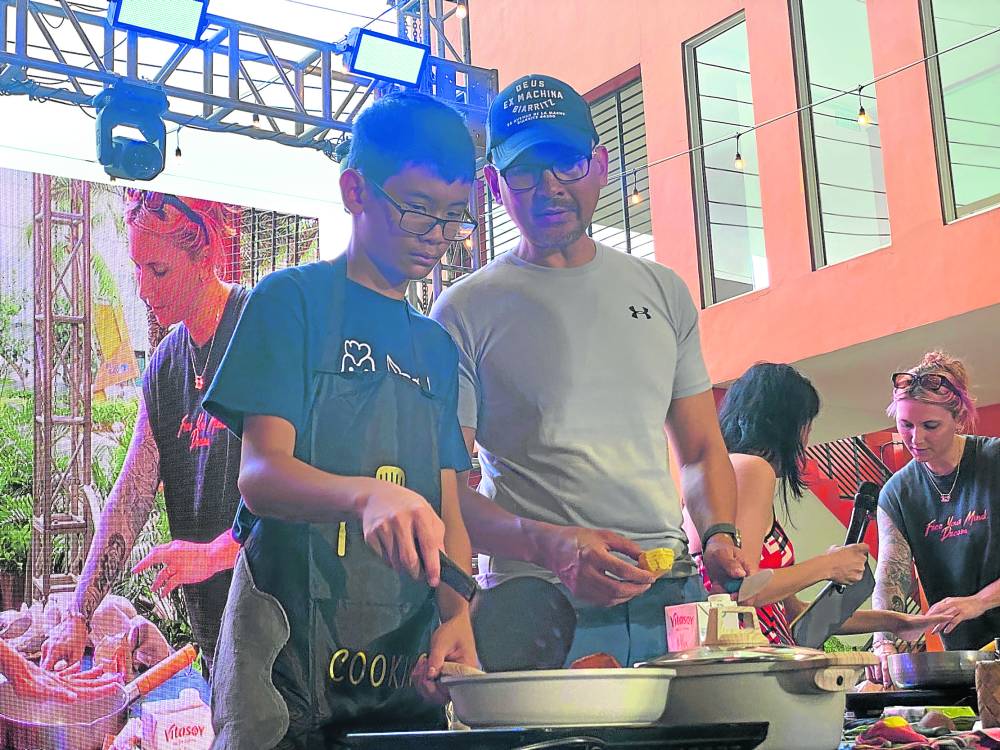 Jack cooking with his father Jason