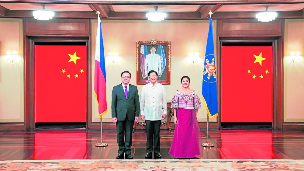 China Ambassador Huang Xilian with the President and first lady Liza Marcos