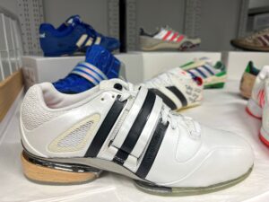 An Adidas weightlifting shoe made for the 2008 Beijing Olympics is pictured, among other Olympic shoes, at the Adidas archive in the company's headquarters in Herzogenaurach, Germany, November 20, 2023. REUTERS/Helen Reid/File Photo