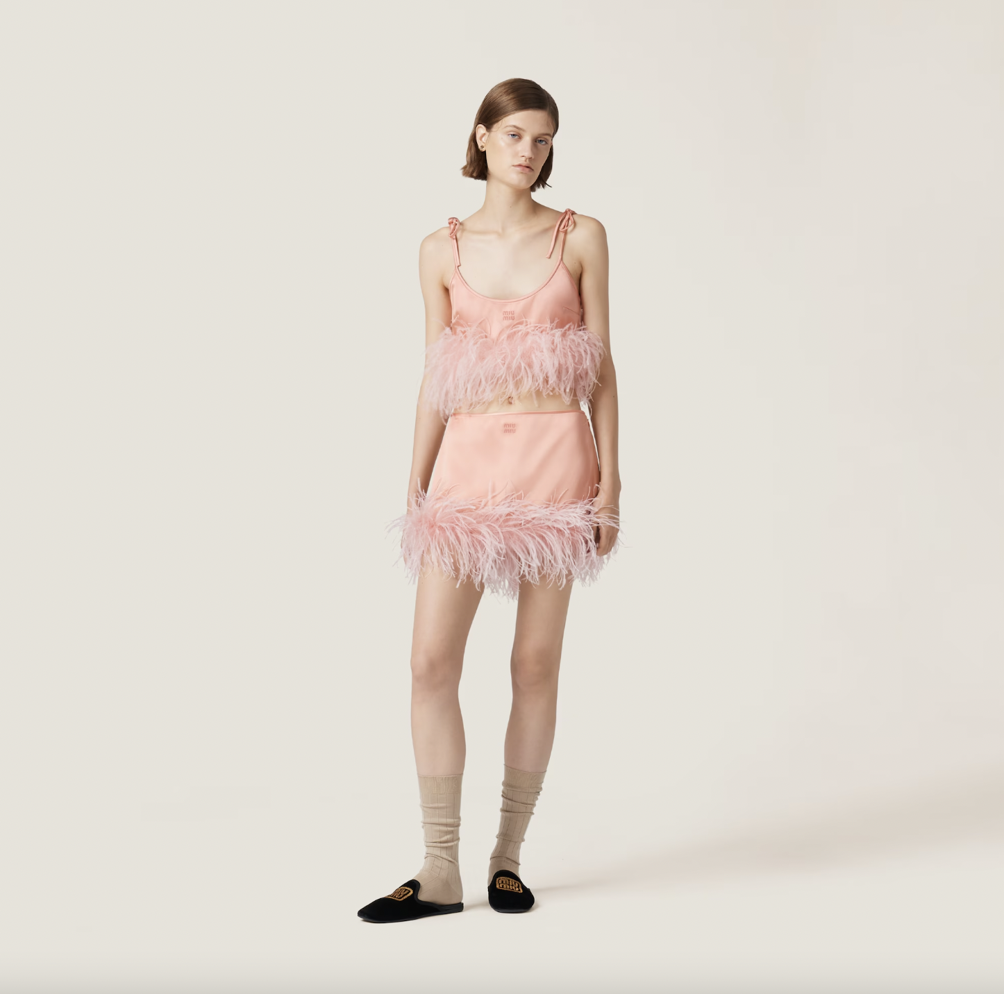 Miu-Miu Feather-trimmed satin miniskirt in Coral ($ 2,750)