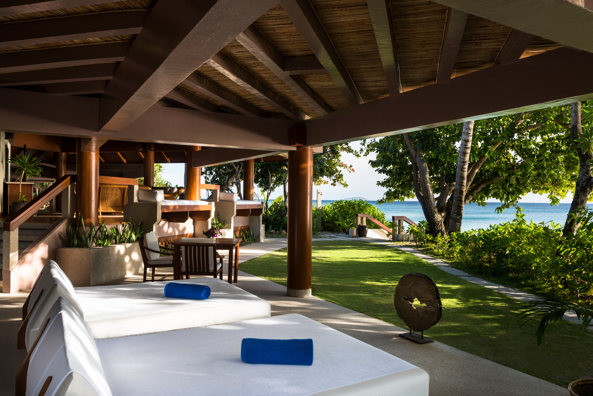 The villa offers al fresco living and dining pavilions overlooking the shore