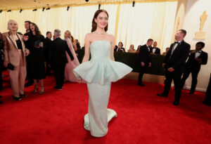 Strong silhouettes, sparkles dominate Oscars red carpet