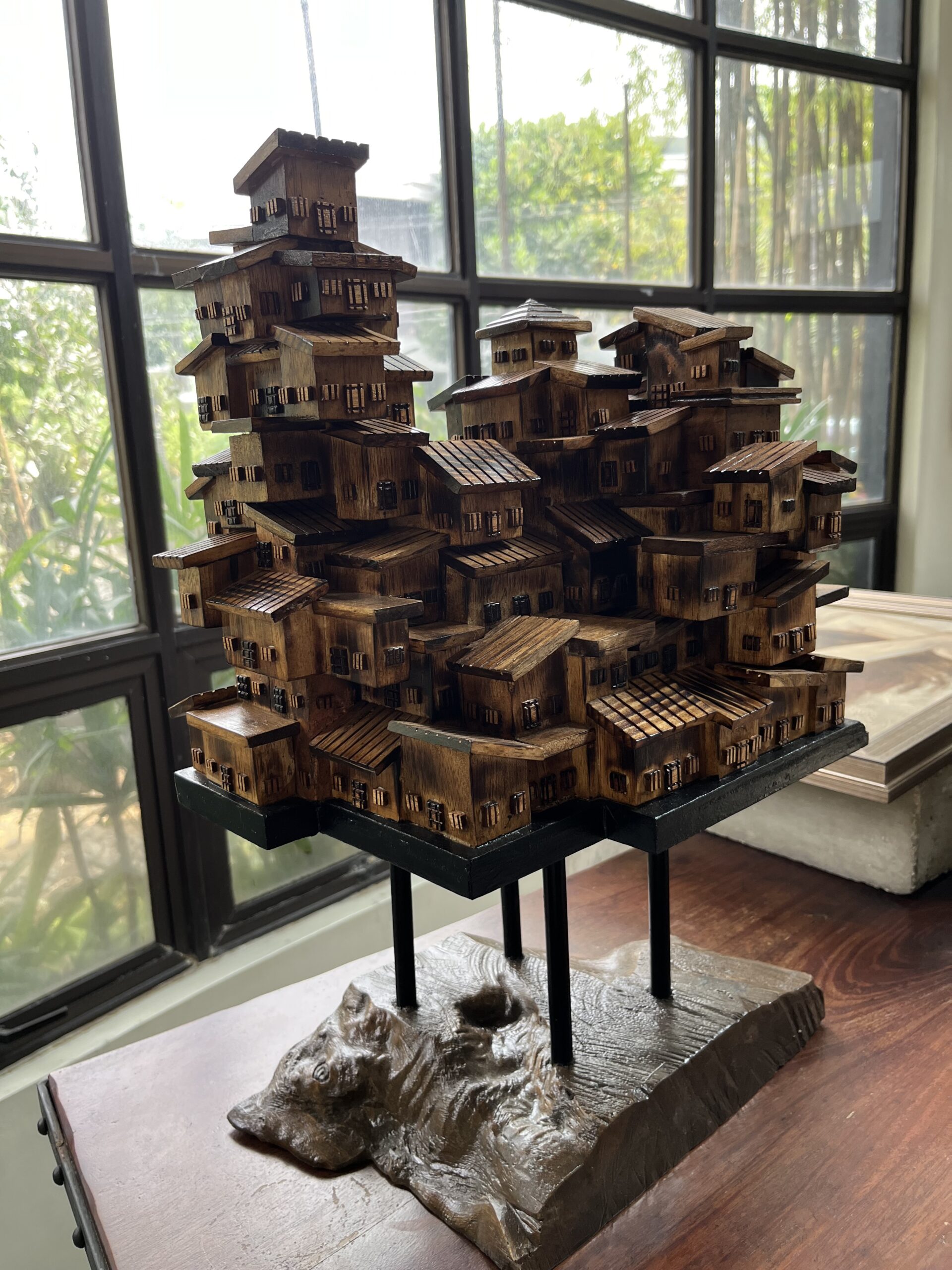 art work featuring houses stacked on one another