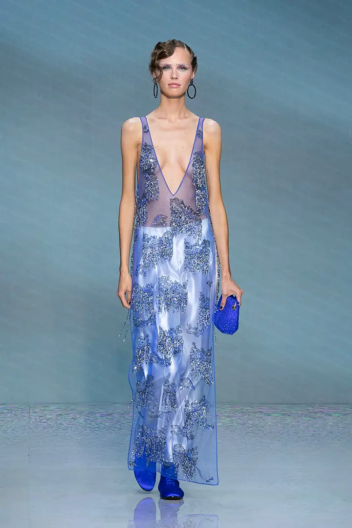 Giorgio Armani’s Embroidered tulle tunic-style dress paired with Silk-and-linen single-dart trousers 