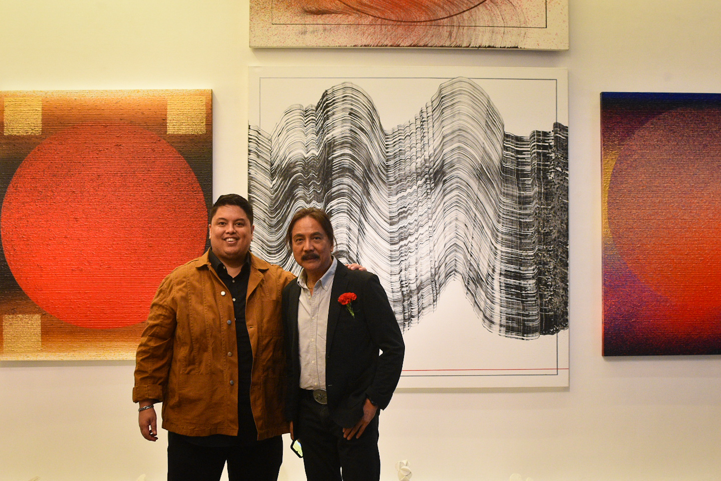 Nestor Olarte Vinluan with exhibition curator and UPCFA alumnus Patrick de Veyra
