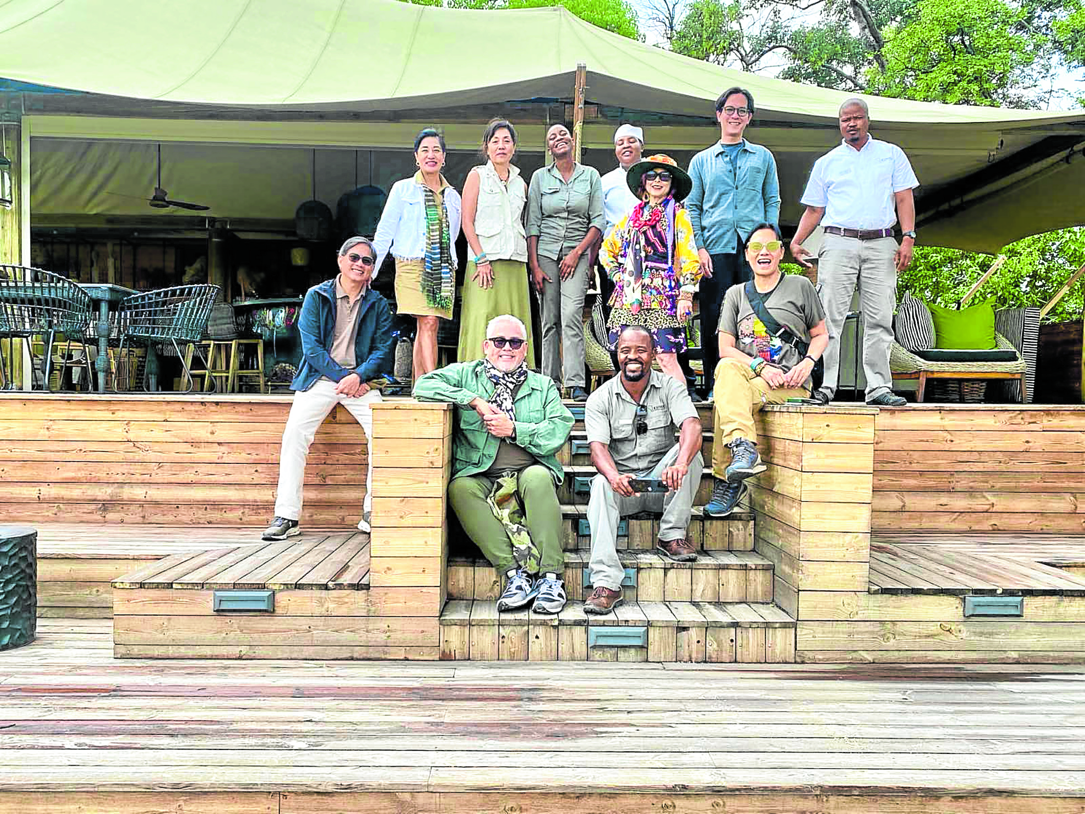 TropAfrica travelers with safari guide KG Bapute and TuludiCamp chef and staff