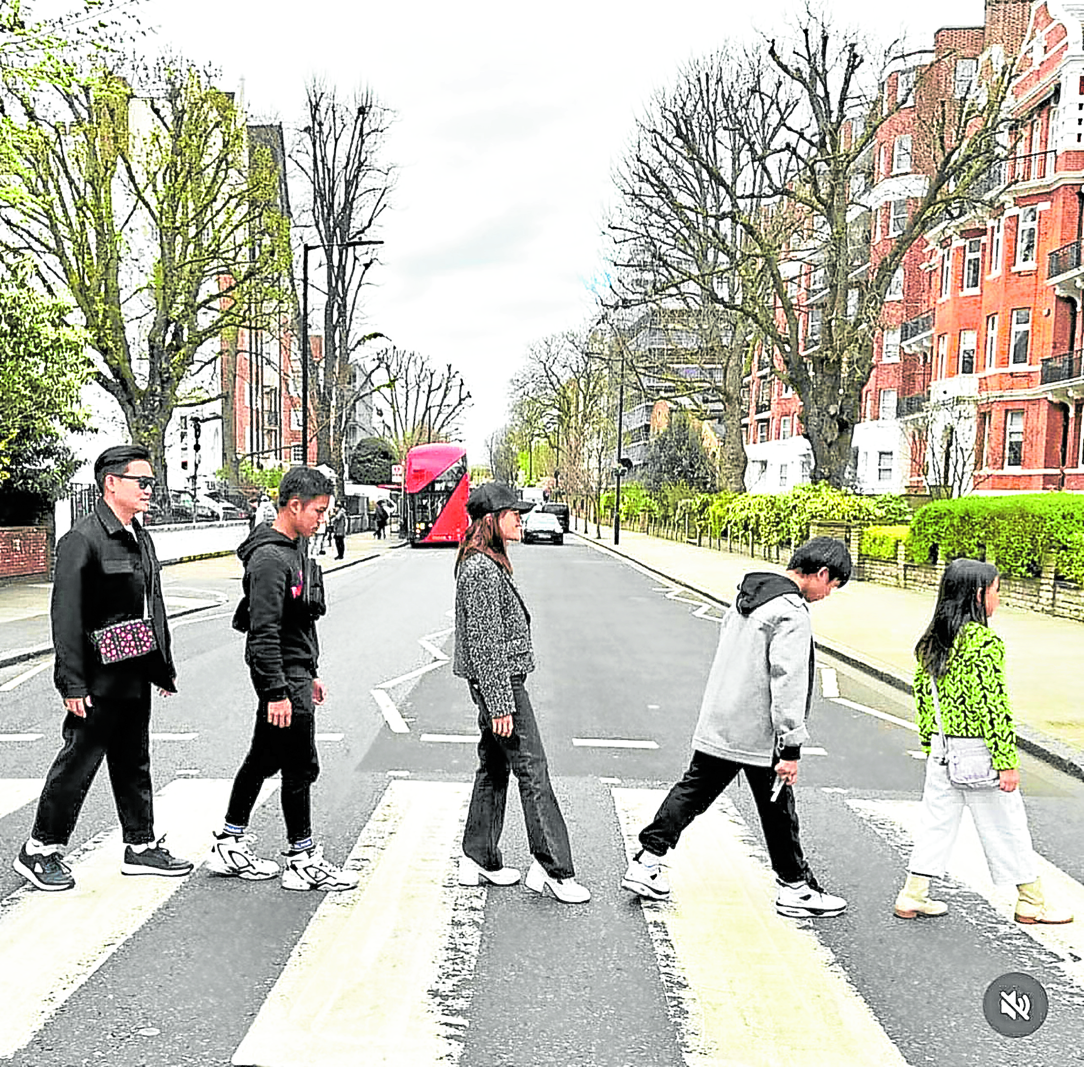 Dr. Aivee Teo and family channeling the Beatles at Abbey Roadin London —CONTRIBUTED PHOTOS