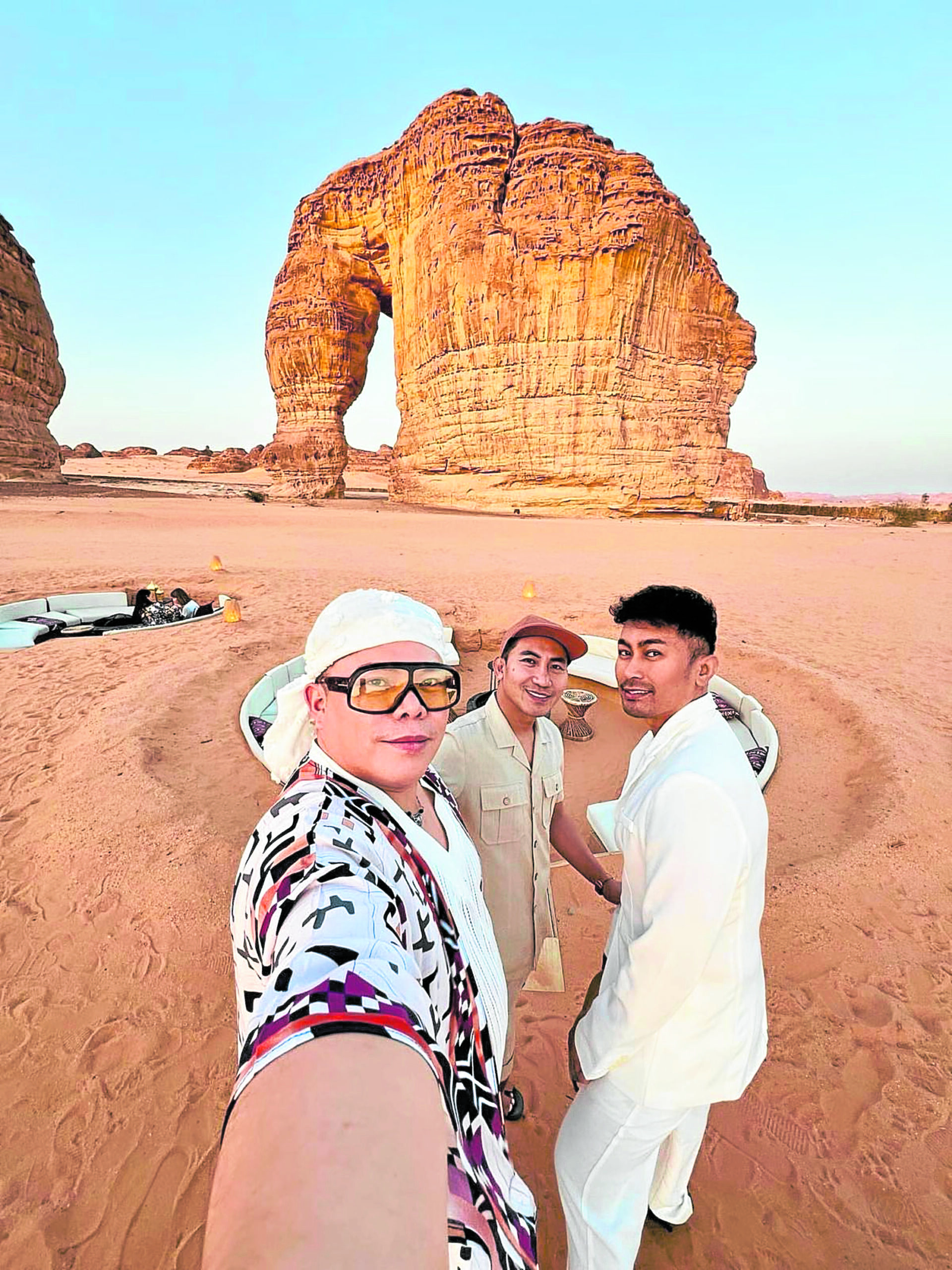 Teddy Manuel,Gideon Hermosa
and Michael Ruiz
at the Elephant
Rock in Alula,
Saudi Arabia