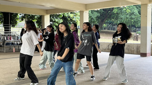 adhika members practicing a routine