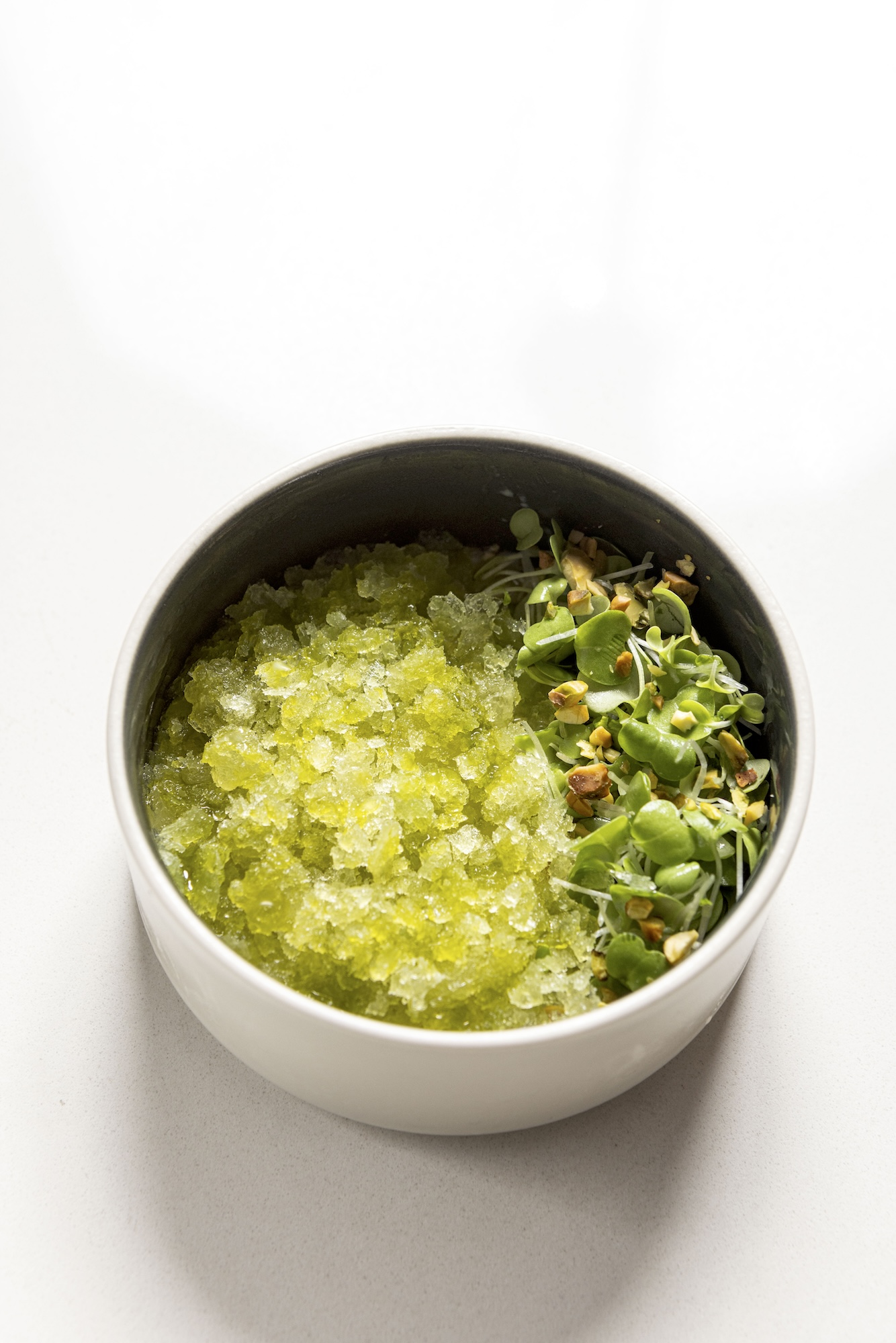 "Envy" (soy panna cotta with ginger and rice vinegar dressing topped with grated cucumber, chopped pistachio, cucumber granita, and cilantro oil)