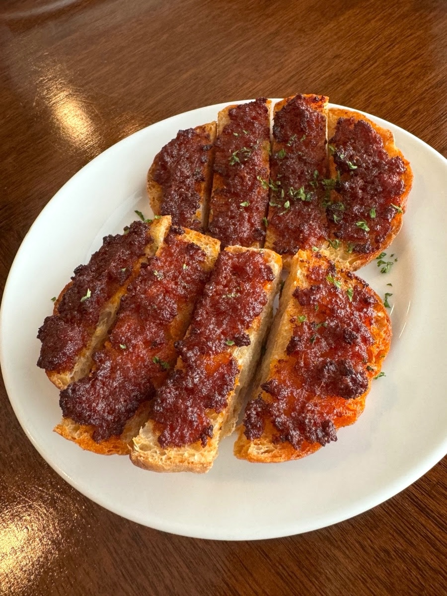 Sobrasada de Mallorca: Toasted chorizo spread on pan de cristal with honey