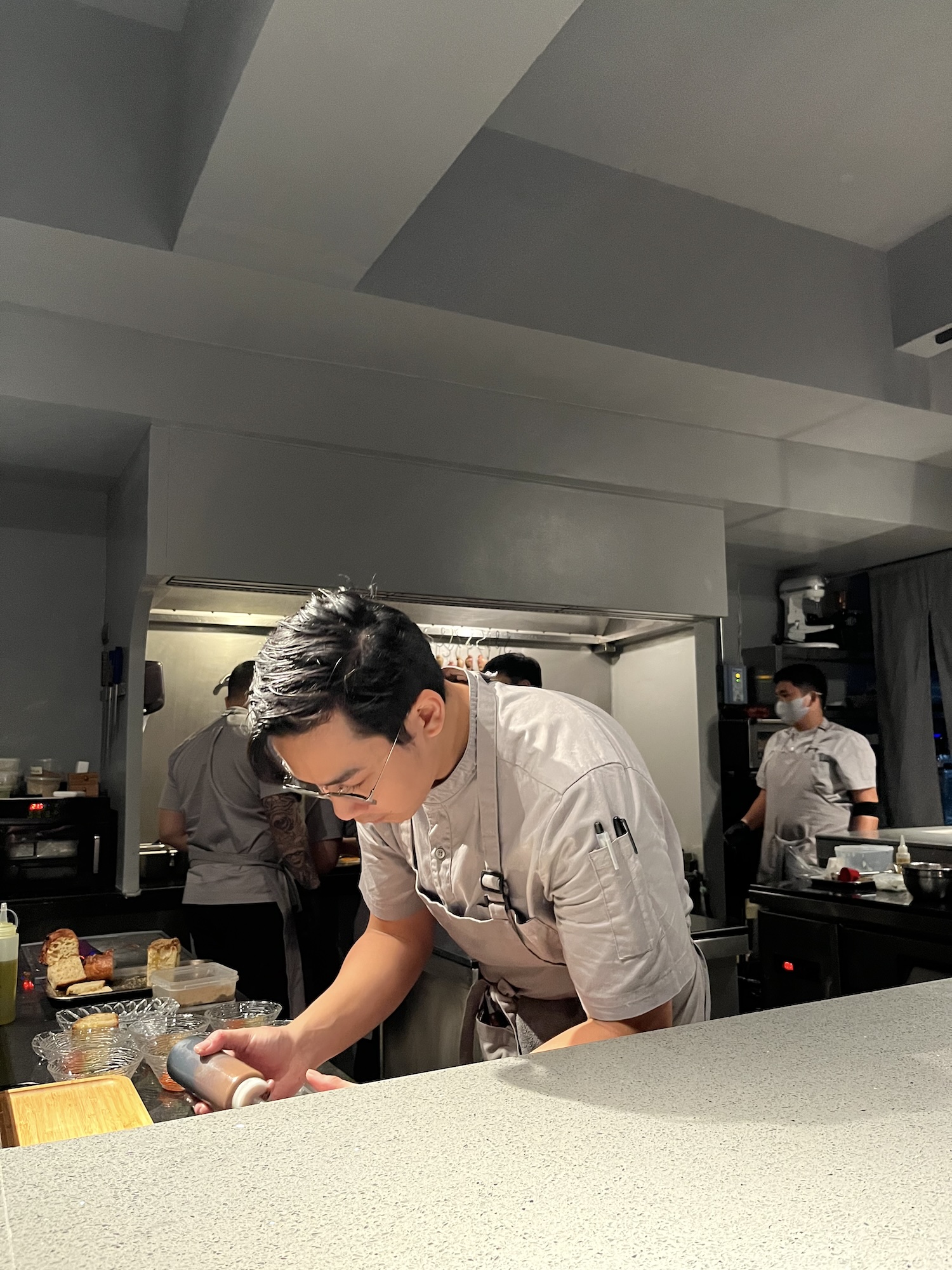 Sous chef Ryuhiko Yato at work with Jorge Mendez and the rest of the Mōdan team