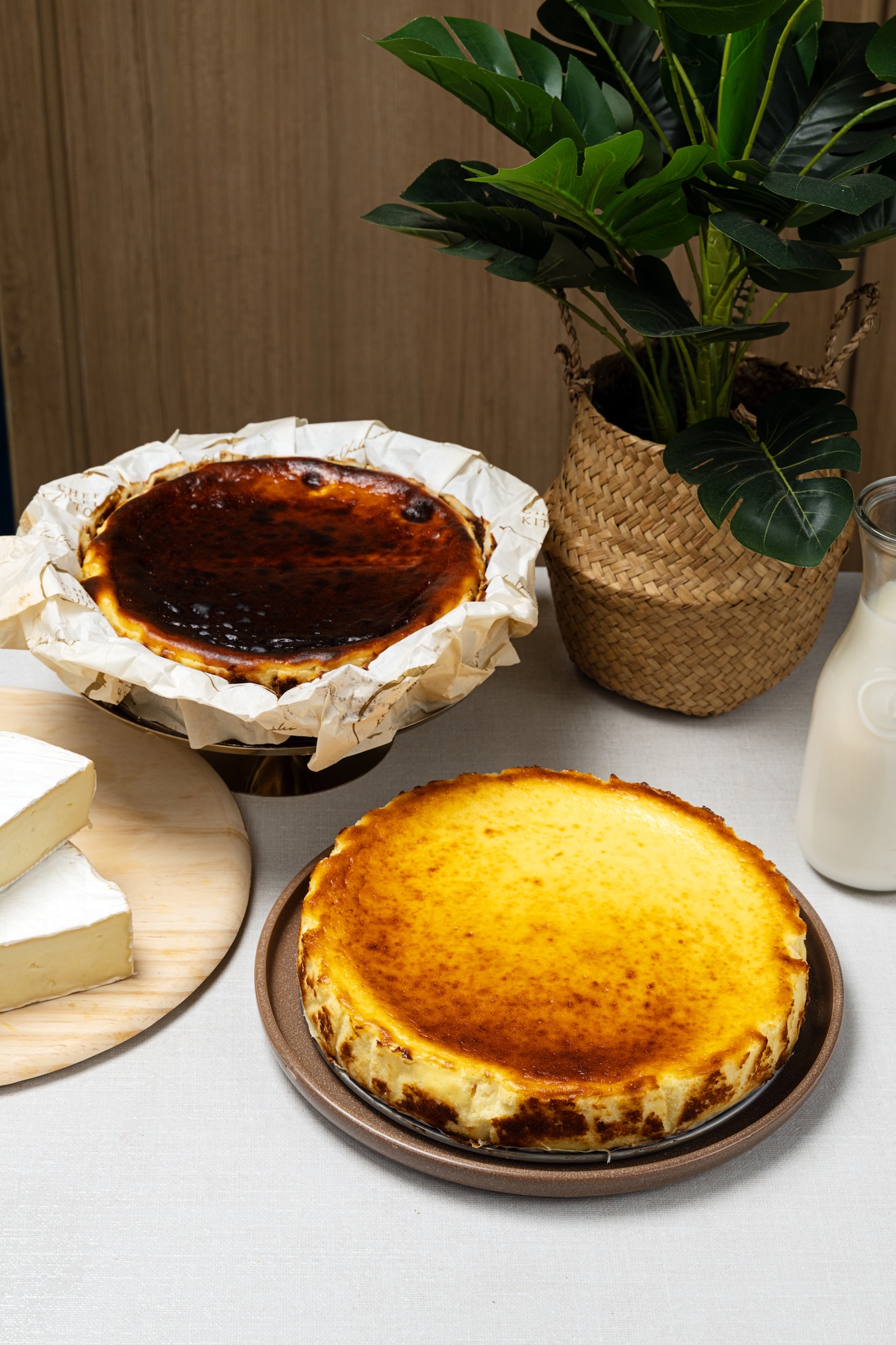 Chele Gonzalez's cheesecake lineup: Tarta de queso (foreground) and traditional burnt Basque cheesecake